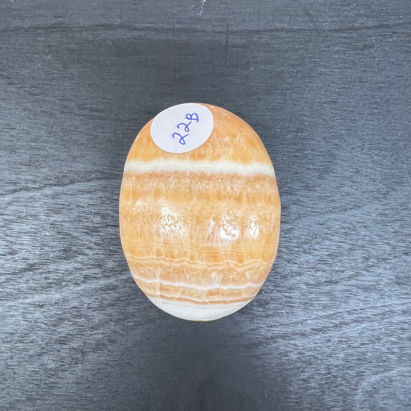 Orange Calcite Palm Stone 22B