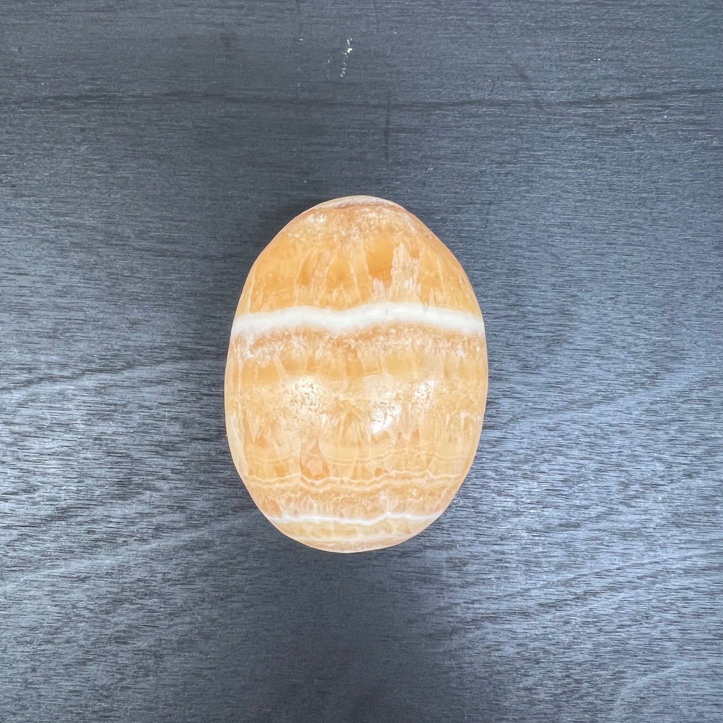 Orange Calcite Palm Stone 23C